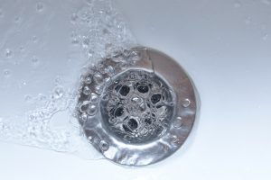 Water flowing down a drain