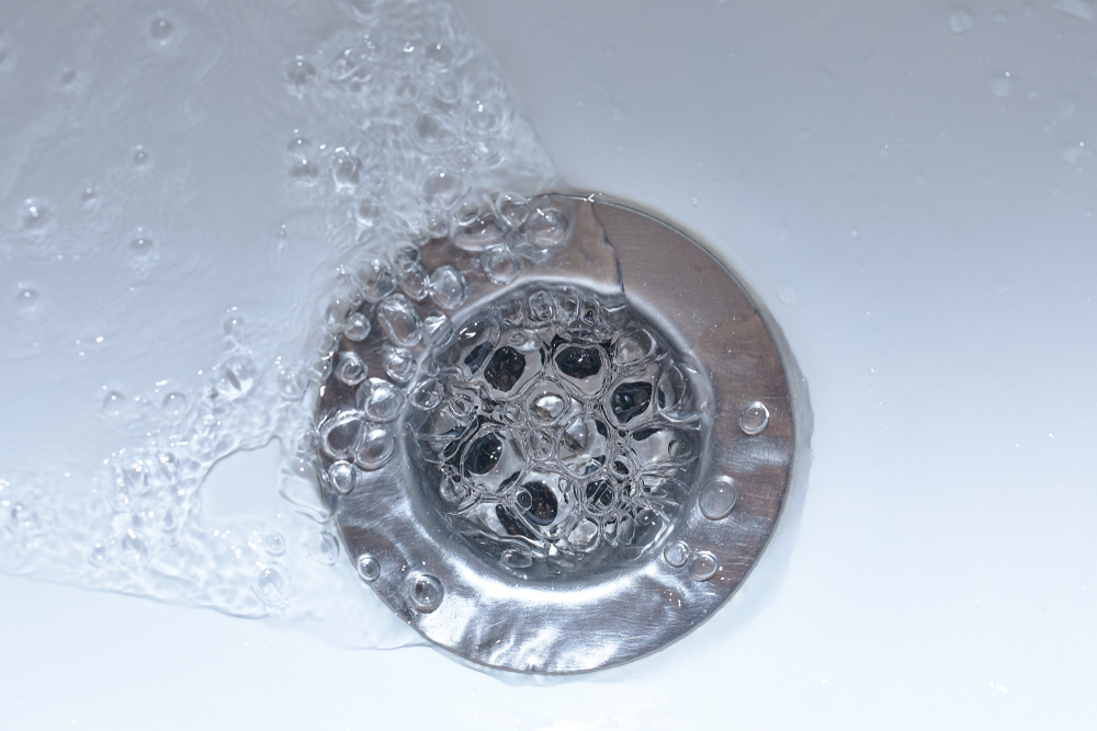 Water flowing down a drain
